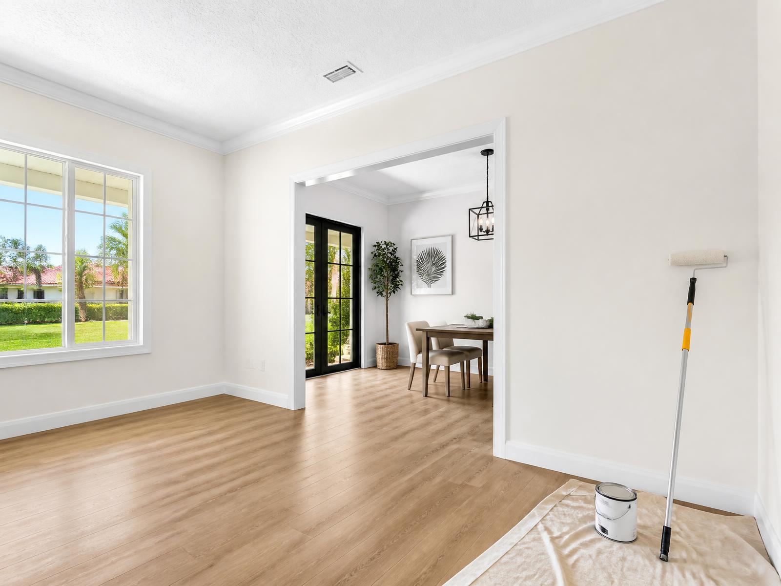 Freshly painted Florida home interior with crisp white trim and warm-white walls